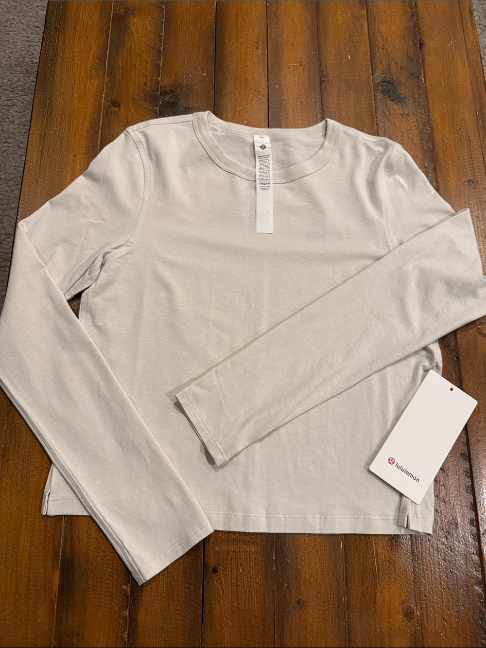 lululemon athletica long sleeve skirted top in light beige